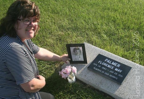 Loretta Houben beside her great- grandmother’s grave in Saskatchewan.